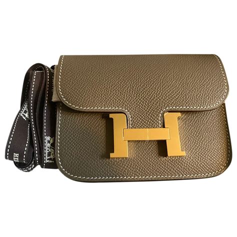 hermes vintage shoulder bag with button|hermes shoulder bag men.